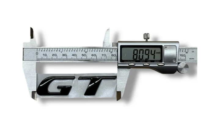 Эмблема GT BMW 81х19.5мм черная